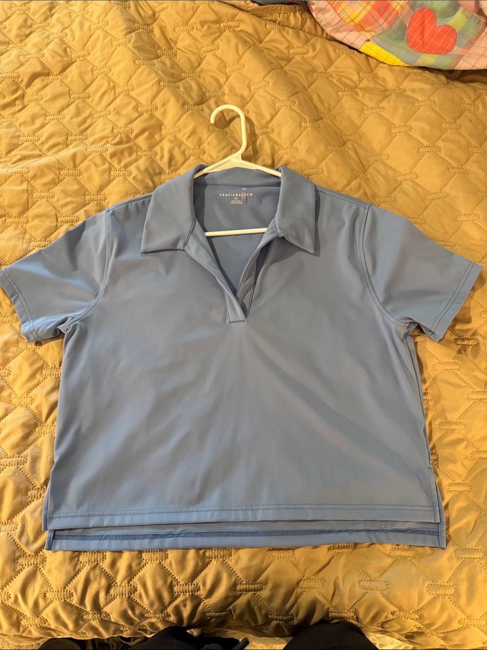 TravisMathew women’s Sky Blue Polo Shirt